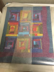 Wax Paper protects the quilt - Cindy Grisdela 