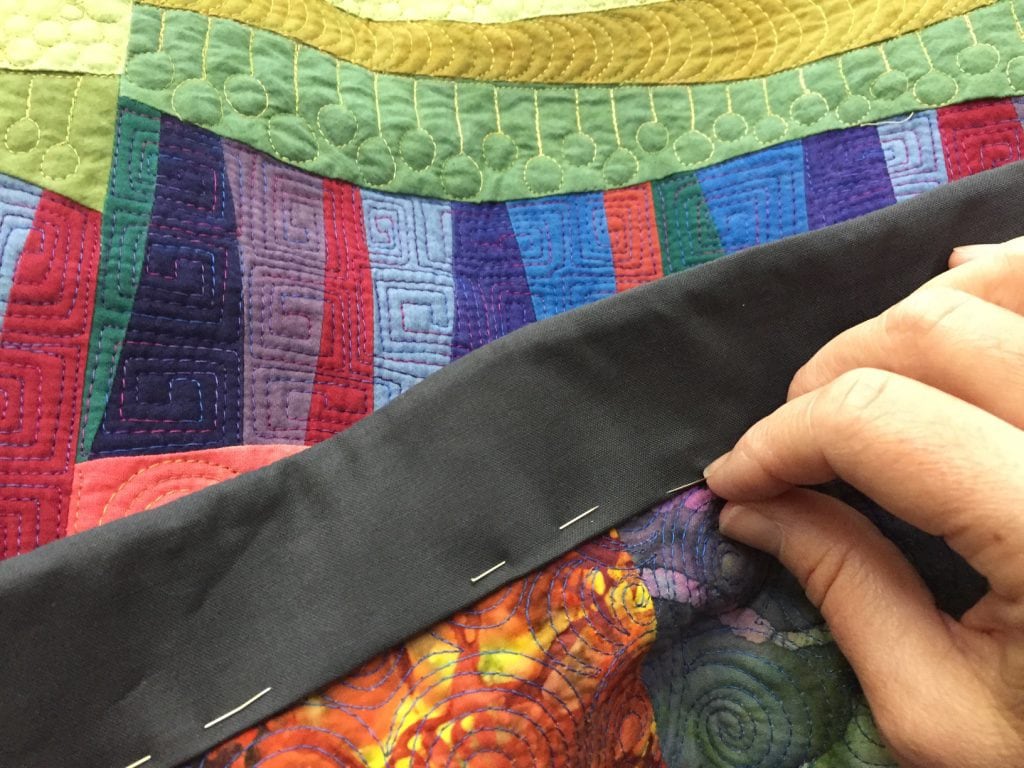 Hand stitching facing down - Cindy Grisdela