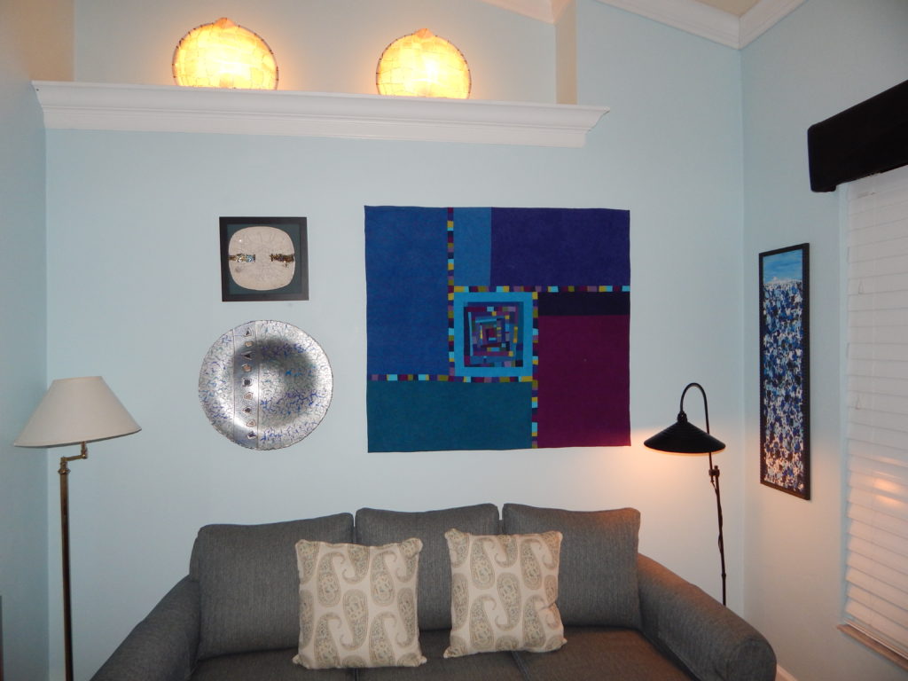Northern Lights art quilt in living room - Cindy Grisdela Art Quilts
