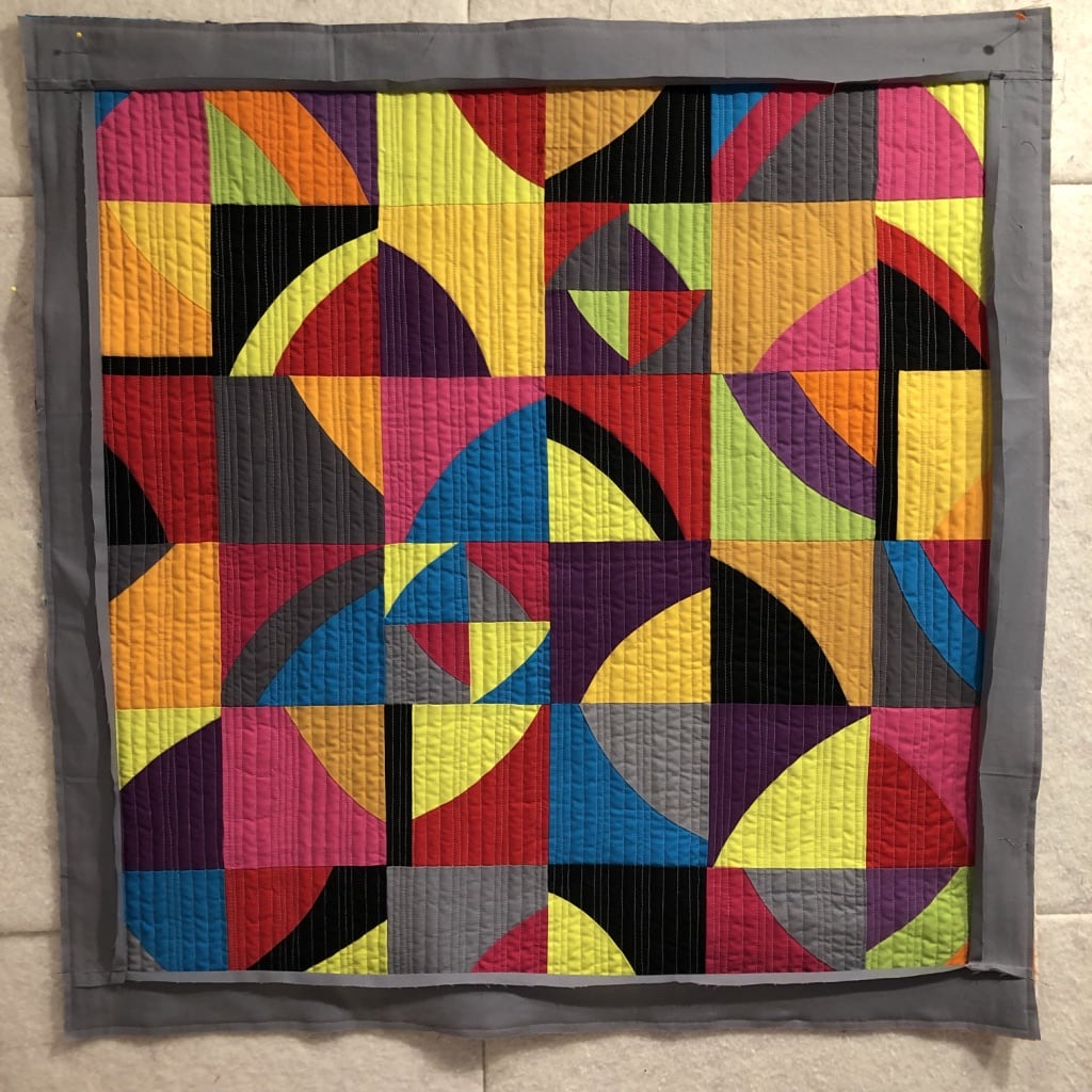 Gray facing "Frame" for an art quilt - Cindy Grisdela