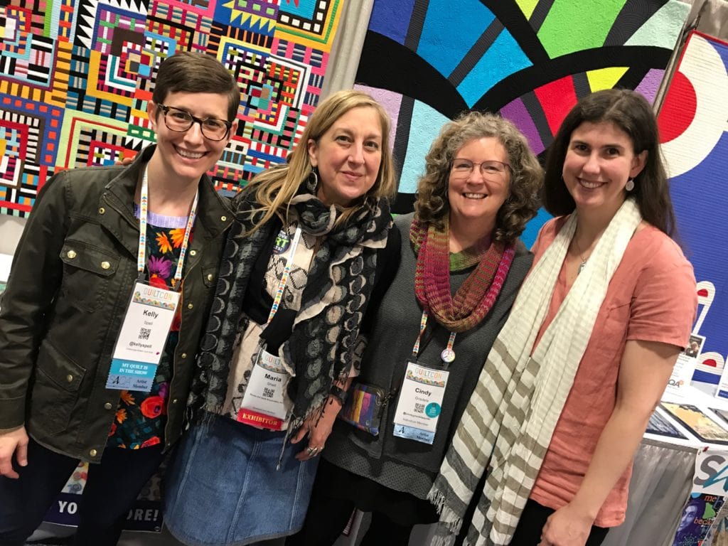 SAQA Members in the booth at QuiltCon 2019